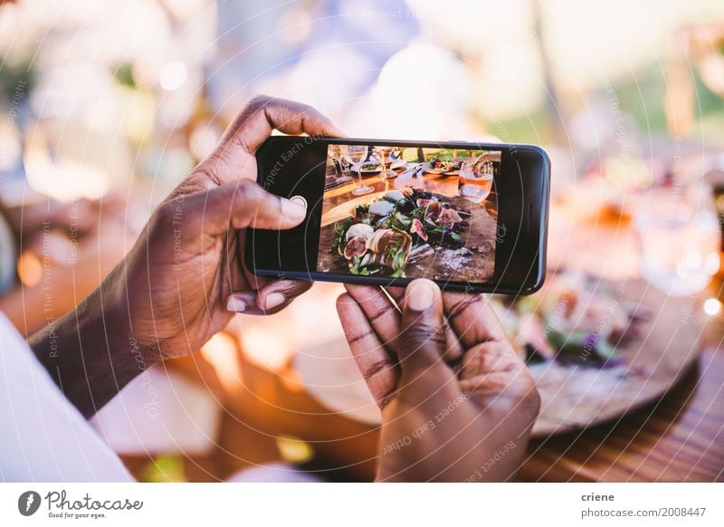 Close-up of man taking photo of food with smart phone Lunch Plate Lifestyle Telephone Cellphone PDA Screen Camera Technology Entertainment electronics High-tech