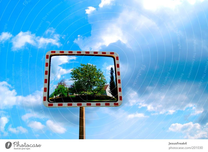 mirror image Nature Sky Clouds Weather Beautiful weather Transport Road traffic Street Metal Signs and labeling Discover Blue Contentment Surrealism Street sign