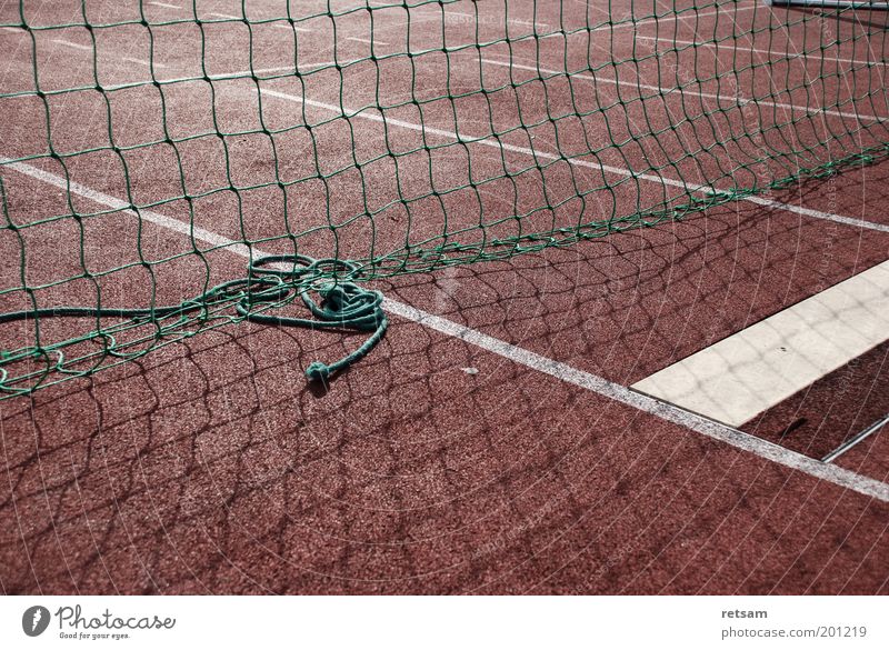 sports field Sports Track and Field Sporting Complex Net Red Colour photo Subdued colour Exterior shot Deserted Morning Light Shadow Sunlight