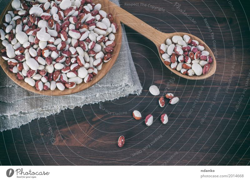 Red white beans in a wooden bowl and spoon Vegetable Fruit Nutrition Eating Vegetarian diet Diet Bowl Spoon Wood Fresh Brown White grain Vegan diet agriculture