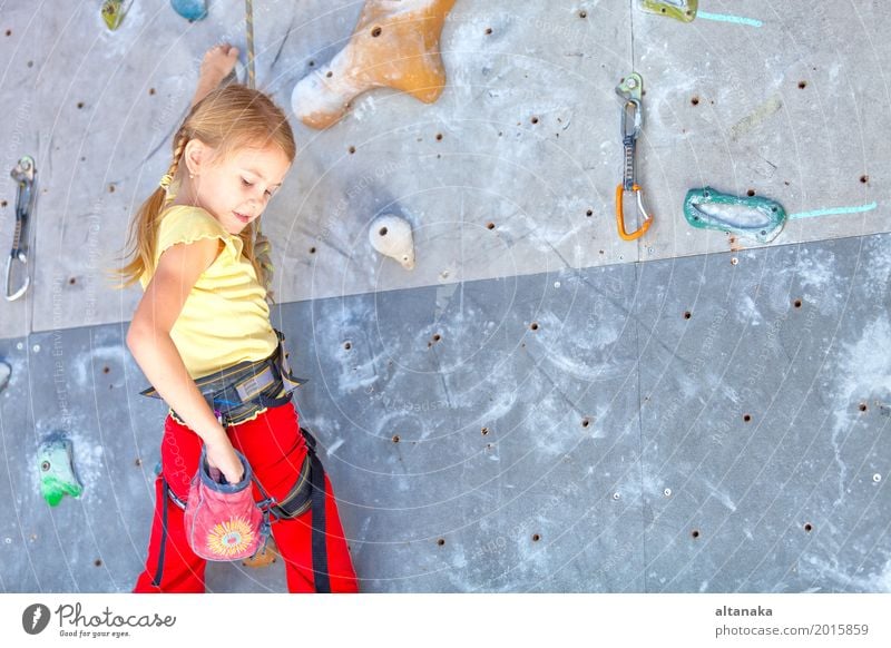 little girl climbing a rock wall indoor Joy Leisure and hobbies Playing Vacation & Travel Adventure Entertainment Sports Climbing Mountaineering Child Rope