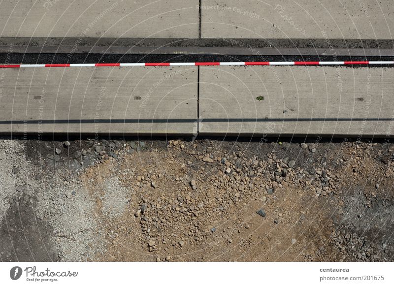 frontiers Earth Sand Stone Concrete Simple Firm Brown Gray Red White Dividing line Barrier Construction site Colour photo Exterior shot Copy Space bottom