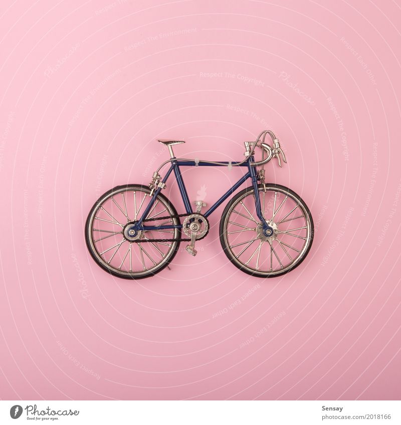 Sport concept - toy bicycles on pink background Style Design Summer Decoration Wallpaper Sports Group Toys Fitness Bright Above Yellow Pink White Colour