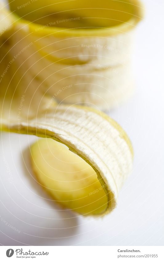 Bananaramama. Food Fruit Nutrition Authentic Fresh Yellow Gold Coil Sheath White Studio shot Detail Macro (Extreme close-up) Vitamin Trash Banana skin
