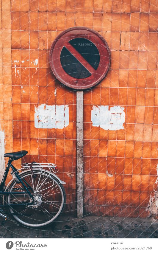 stopping restriction Small Town Capital city Outskirts Old town Wall (barrier) Wall (building) Facade Signs and labeling Bicycle City life Morocco Orange