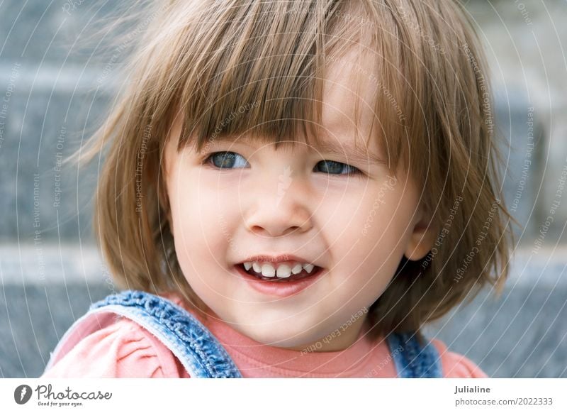 Cute Caucasian girl with short hair - a Royalty Free Stock Photo from  Photocase