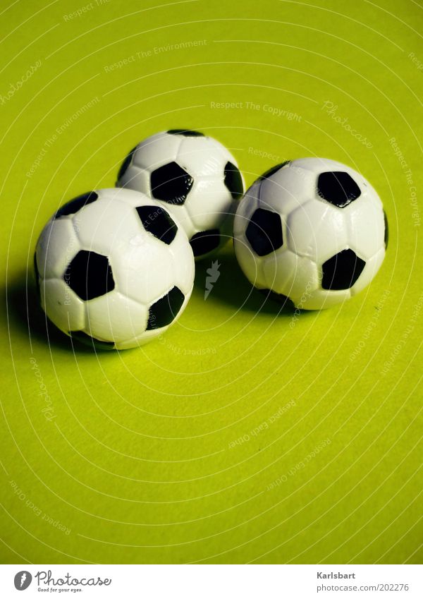 3.0 Leisure and hobbies Sports Ball sports Foot ball Round Toys Green Colour photo Multicoloured Studio shot Close-up Detail Pattern Structures and shapes