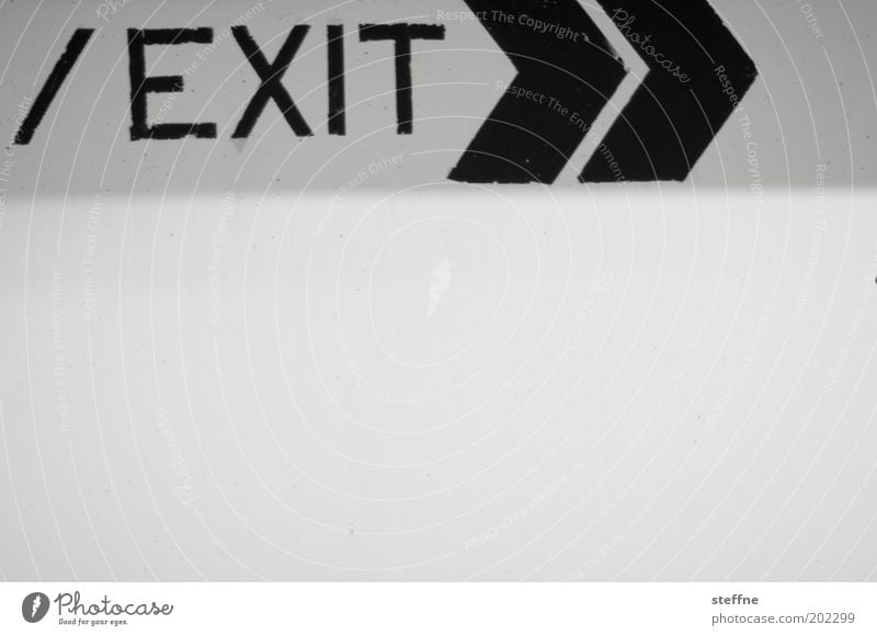 /EXIT>> Sign Characters Goodbye exit Way out Parking garage Signage Black & white photo Interior shot Central perspective Trend-setting Arrow Deserted