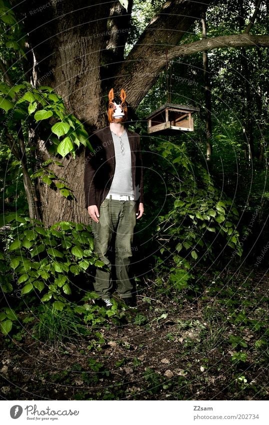 bavarian aboriginal Human being Masculine 1 Nature Tree Bushes Forest Mask Stand Dark Creepy Rebellious Trashy Crazy Power Perturbed Bizarre Whimsical Strange
