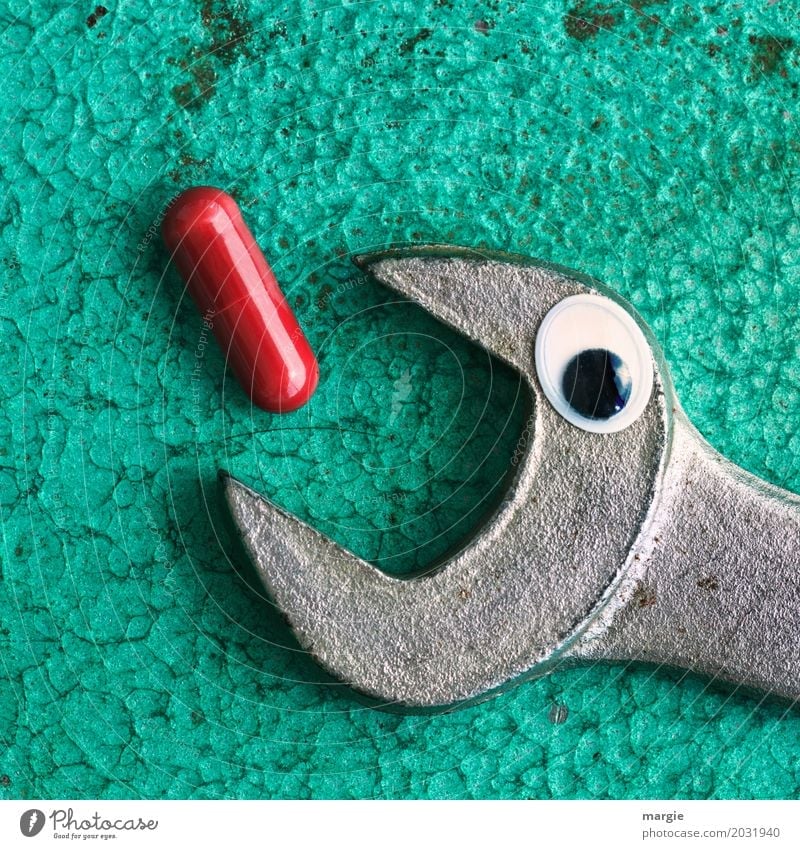 1x in the morning: wrench with eye and a red pill, medicine Healthy Health care Medical treatment Illness Medication Work and employment Profession Craftsperson