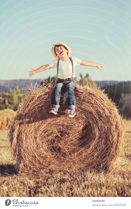 Kid playing in wheat field. Lifestyle Children's game Vacation & Travel Summer Human being Boy (child) Body 1 3 - 8 years Infancy Nature Landscape Field Jeans