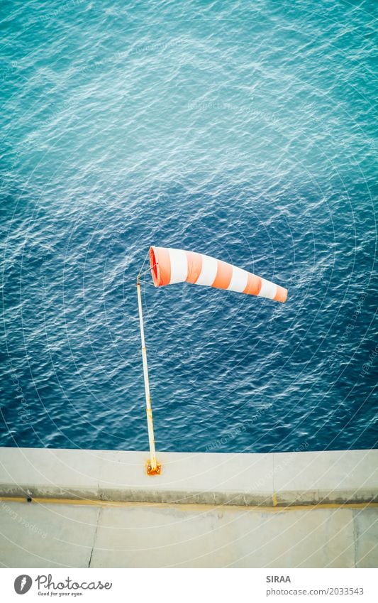 blowing in the wind Water Beautiful weather Wind Ocean Harbour Blue Red Windsock Flag Air level Weather Wind speed Air speed meter Wind direction wind force