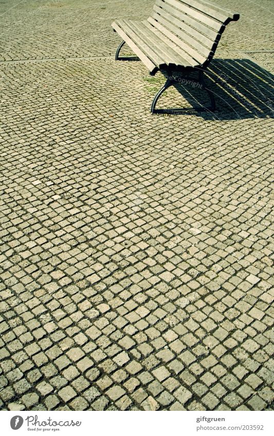 sunbed Deserted Places Calm Boredom Far-off places Bench Park bench Break Shadow Tanning bed Paving stone Cobblestones Wooden bench Empty Loneliness Seating