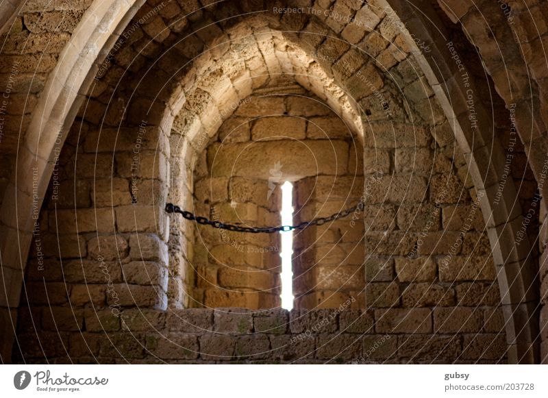 ceasarea Israel Near and Middle East Ruin Window Chain Brick Arch Roman era Penitentiary Remote Subdued colour Interior shot Deserted Day Sunlight