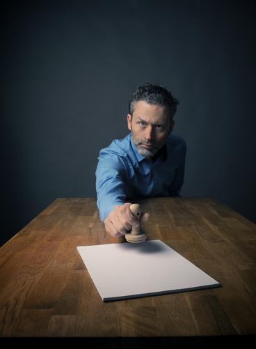 stamp on it Office Business Crazy paper letter signing Background picture beard Businessman Expressive face geek stubborn Guy Hipster looking nerd nerdy