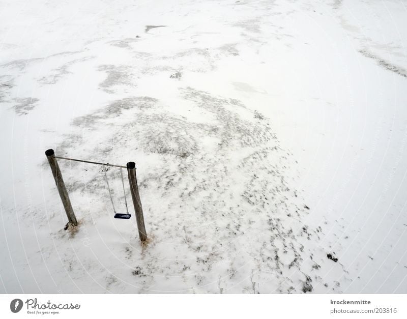 icy childhood Landscape Winter Bad weather Snow To swing Loneliness Swing Ice Wooden stake Cold Infancy Playground Bird's-eye view White Colour photo