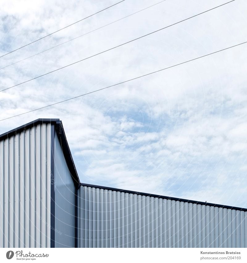 one bird, zigzag and diagonal Sky Clouds Building Hall Storage Industrial construction Facade Cladding Sharp-edged Simple Blue Gray Silver