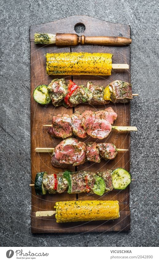 Various meat skewers with vegetables and corn on the cob Food Meat Vegetable Herbs and spices Lunch Banquet Picnic Organic produce Style Design Table Kitchen