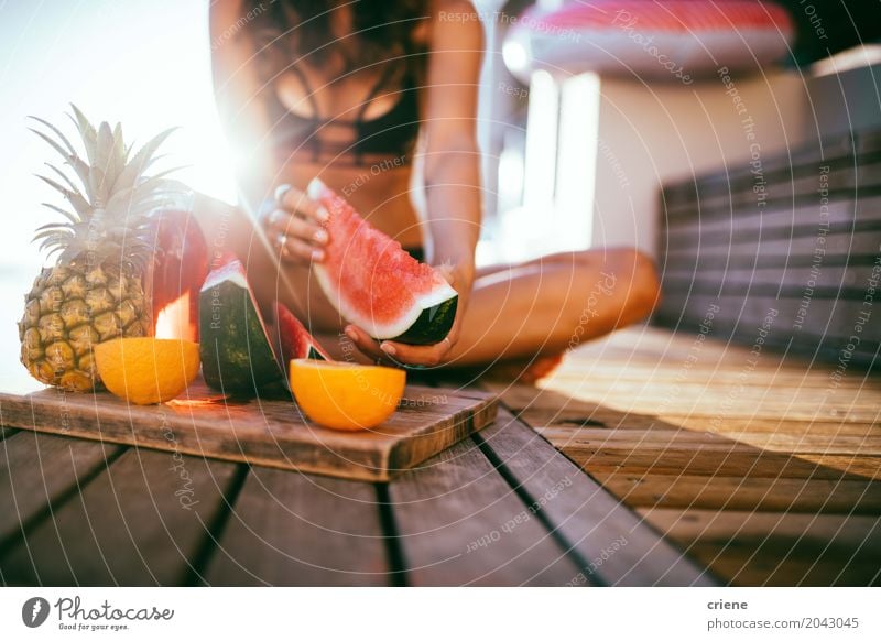 Woman eating fresh watermelon on balcony in summer Fruit Nutrition Eating Lifestyle Joy Healthy Eating Leisure and hobbies Summer Summer vacation Sun