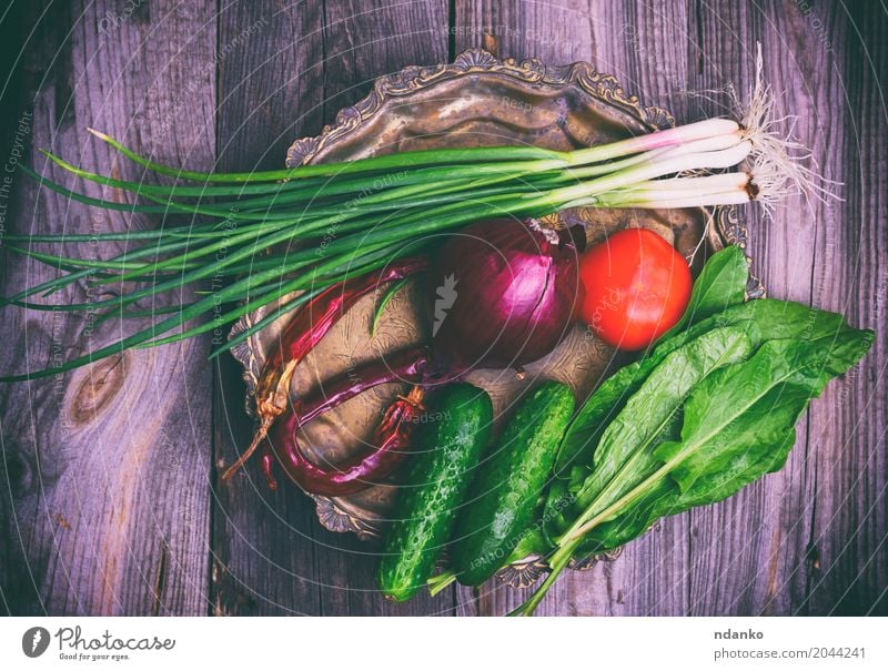 Fresh vegetables on an iron copper plate Food Vegetable Nutrition Vegetarian diet Diet Crockery Plate Kitchen Eating Natural Gray Green Red Tomato cucumber
