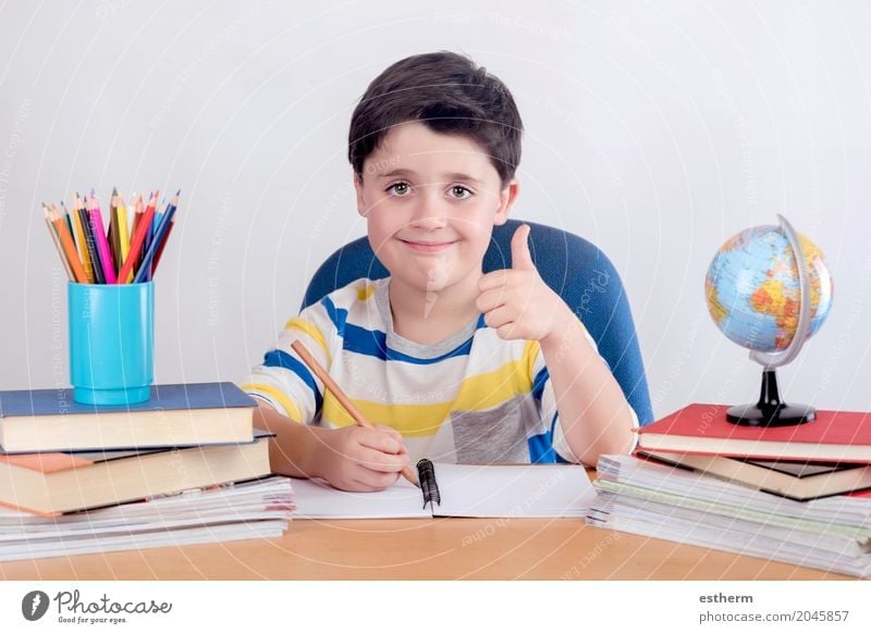 Smiling boy studying Lifestyle Parenting Education Kindergarten Child School Study Classroom Human being Toddler Boy (child) Infancy 1 3 - 8 years Write Happy