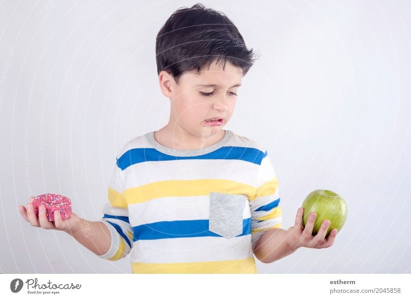 Little boy does not want to eat fruit Food Fruit Roll Dessert Candy Nutrition Eating Lifestyle Health care Healthy Eating Human being Child Toddler Boy (child)