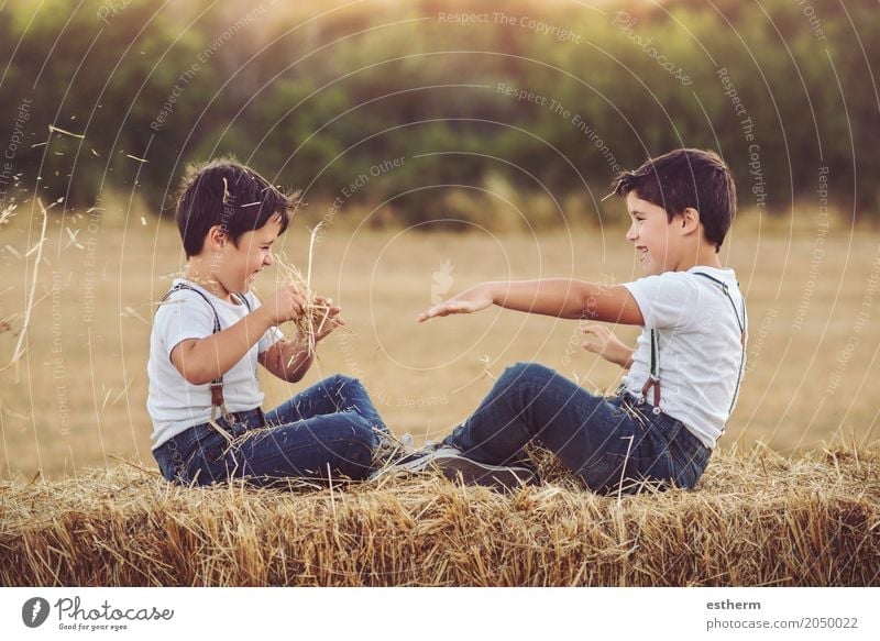 Brothers playing with straw Lifestyle Children's game Human being Masculine Toddler Boy (child) Brothers and sisters Family & Relations Friendship Infancy 2