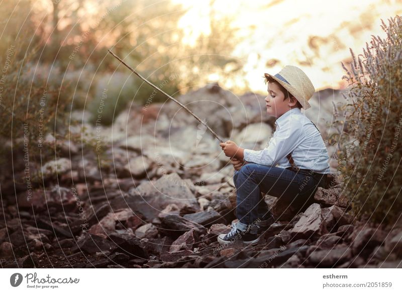 Pensive boy on the river Lifestyle Playing Fishing (Angle) Human being Child Toddler Boy (child) Infancy 1 3 - 8 years Nature River Hat Smiling Emotions Joy