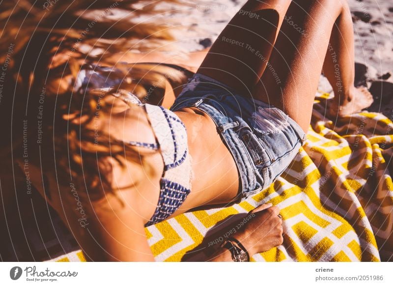 Woman tanning and relaxing at beach on sunny hot summer day Lifestyle Joy Body Wellness Relaxation Leisure and hobbies Vacation & Travel Summer Summer vacation
