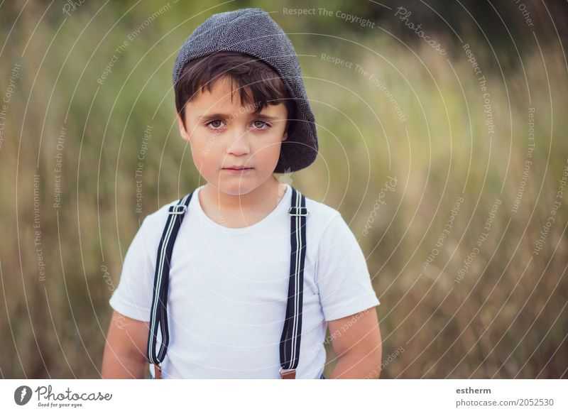 pensive boy Lifestyle Human being Masculine Child Toddler Boy (child) Infancy 1 3 - 8 years Nature Spring Summer Park Forest Cap Joy Happiness Curiosity Hope