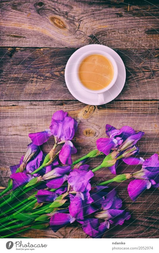 bouquet of irises and a cup of coffee Breakfast Coffee Espresso Mug Table Restaurant Flower Bouquet Wood Fresh Hot Above Retro Violet White Iris Purple Café
