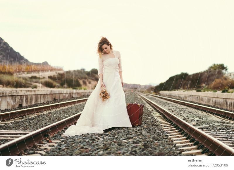 Pensive bride with a red suitcase on the train tracks Lifestyle Elegant Style Vacation & Travel Tourism Trip Adventure Freedom Wedding Human being Feminine