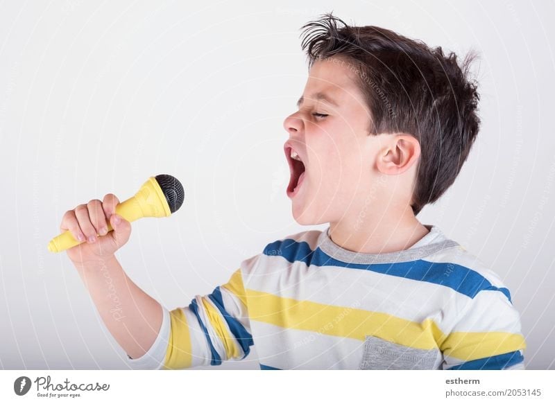 Boy singing to microphone Lifestyle Human being Child Toddler Boy (child) Infancy 1 3 - 8 years Artist Stage play Music Listen to music Singer Musician Smiling