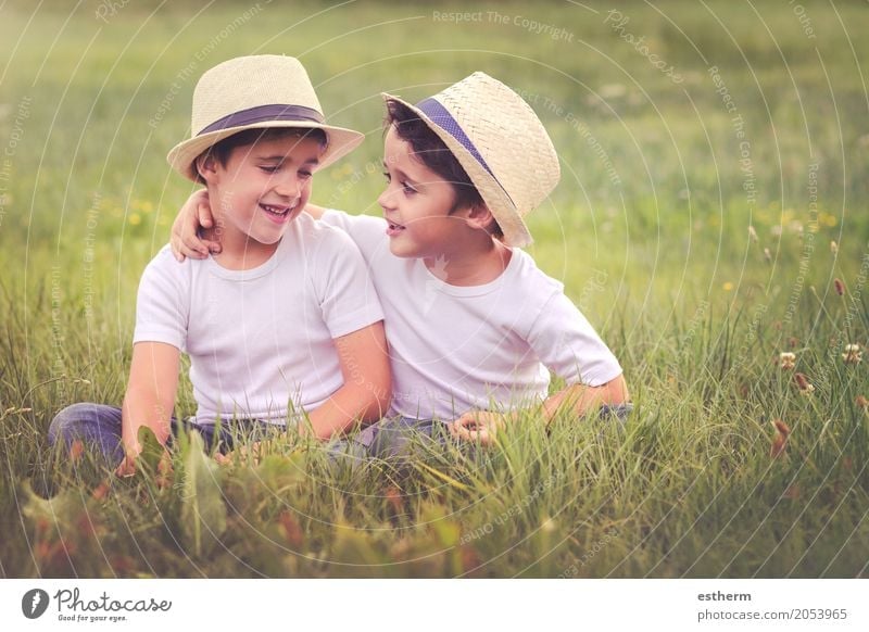 happy siblings sitting in the field Lifestyle Human being Masculine Child Toddler Boy (child) Brothers and sisters Family & Relations Friendship Infancy 2