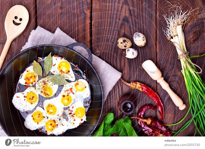 Fried quail eggs Herbs and spices Breakfast Lunch Dinner Pan Spoon Kitchen Restaurant Eating Fresh Natural Above Multicoloured Tradition Onion Dish lettuce