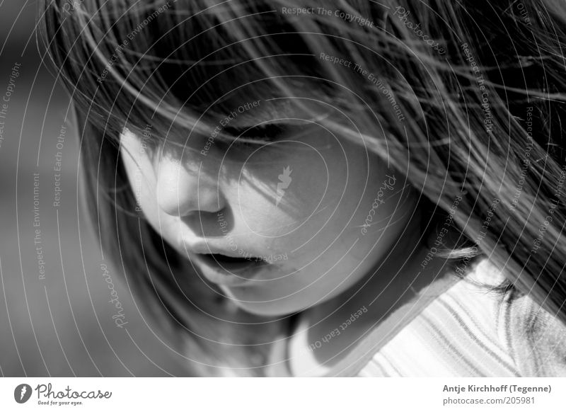 ... Human being Child Girl Infancy Face 1 8 - 13 years Emotions Safety (feeling of) Beautiful Cute Black & white photo Exterior shot Downward Long-haired Shadow