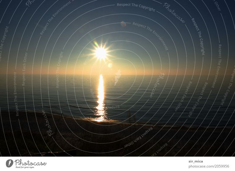 Sunrise at sea Far-off places Summer vacation Beach Ocean Horizon Sunset Sunlight Beautiful weather Coast Relaxation Glittering Reflection Waves Colour photo