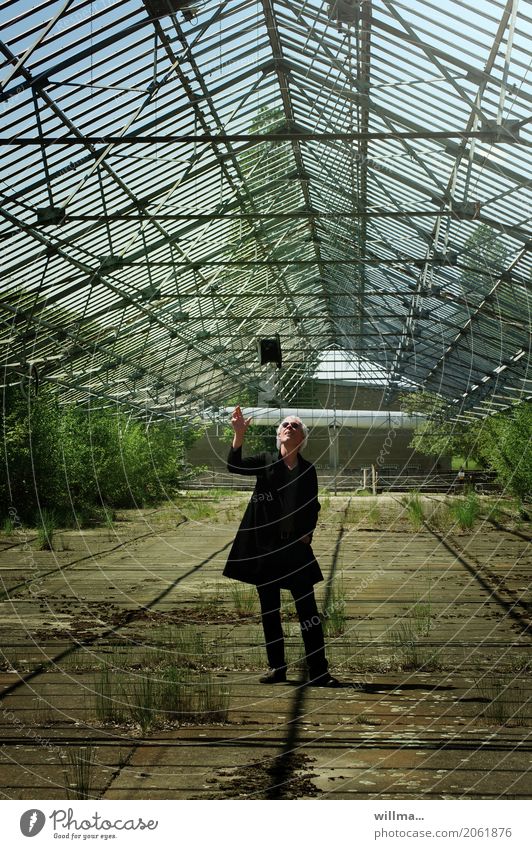 Man in frock coat throws top hat in the air Frock coat Cylinder Sunglasses Hat Greenhouse White-haired Throw bushes Full-length Front view Human being Masculine