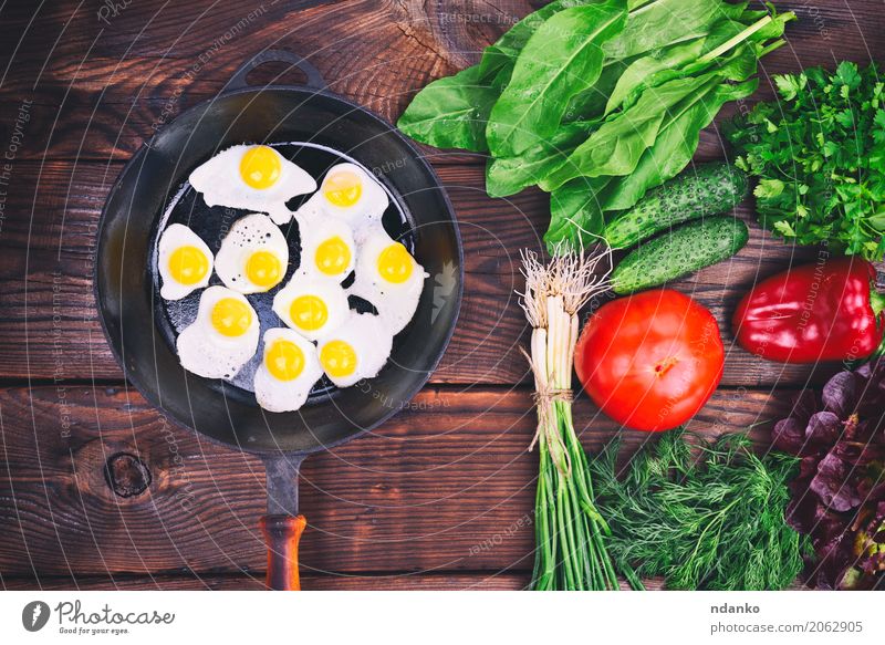 Fried quail eggs Herbs and spices Eating Breakfast Lunch Dinner Pan Kitchen Restaurant Fresh Natural Above Brown Green Red Tradition Onion Dish lettuce pepper