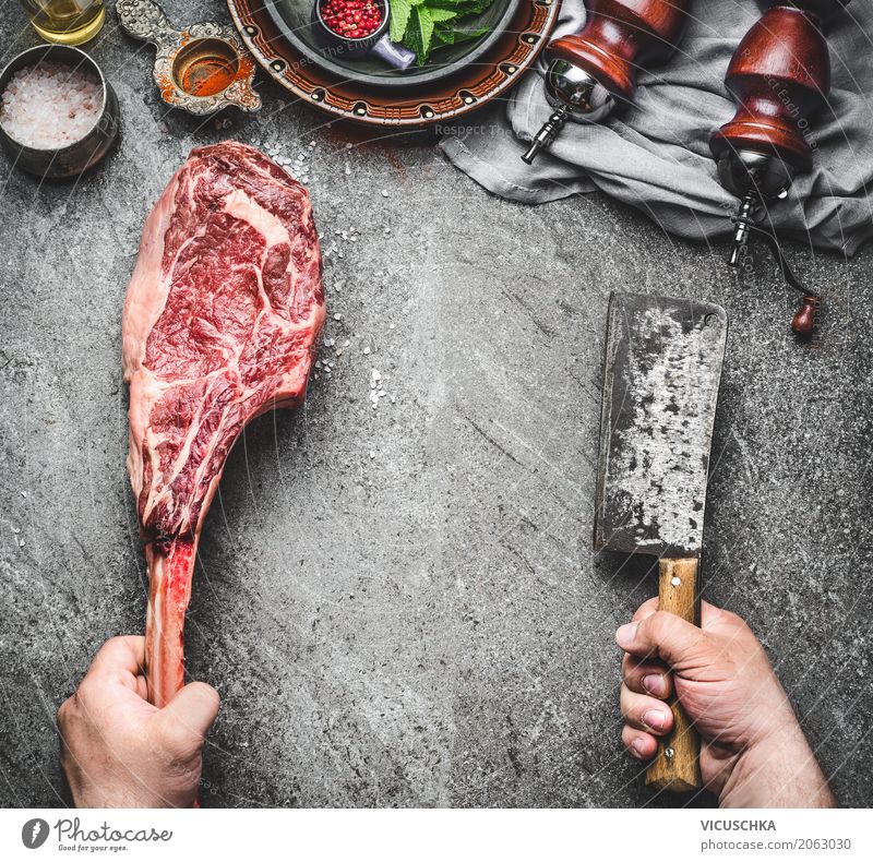 Male hands holding Tomahawk beef steak Food Meat Nutrition Picnic Organic produce Crockery Knives Style Design Table Kitchen Human being Masculine Hand Steak