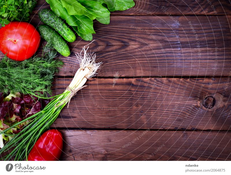 Fresh vegetables and parsley with dil Vegetable Lettuce Salad Herbs and spices Leaf Wood Retro Brown Green Red Onion Ingredients Raw background empty space