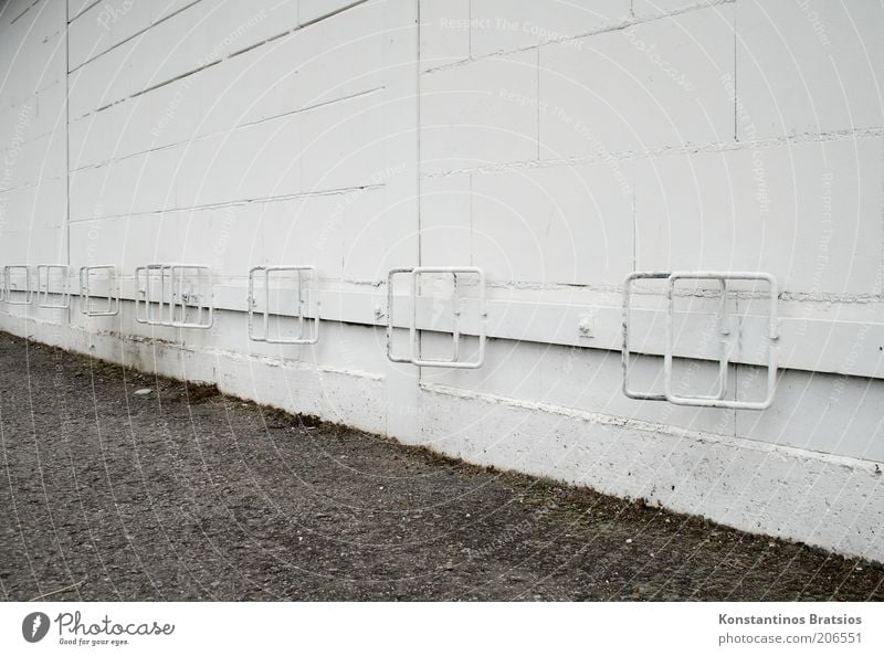 nice folding stand Wall (barrier) Wall (building) Facade Old Simple Under White Parking lot Free Metal Seam Bicycle rack Parking area Colour photo