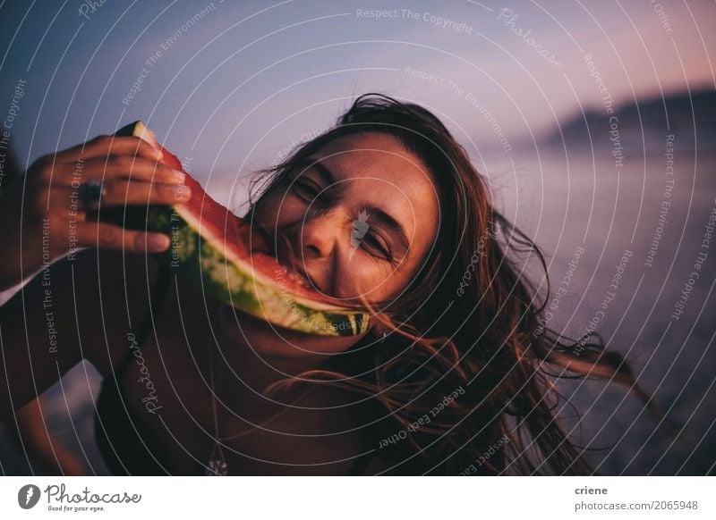 Woman eating watermelon on beach Food Fruit Nutrition Eating Lifestyle Joy Vacation & Travel Summer Beach Human being Feminine Young woman Youth (Young adults)