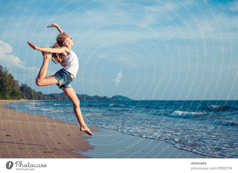 One teen girl jumping on the beach Lifestyle Joy Happy Relaxation Leisure and hobbies Playing Vacation & Travel Trip Adventure Freedom Summer Sun Beach Ocean
