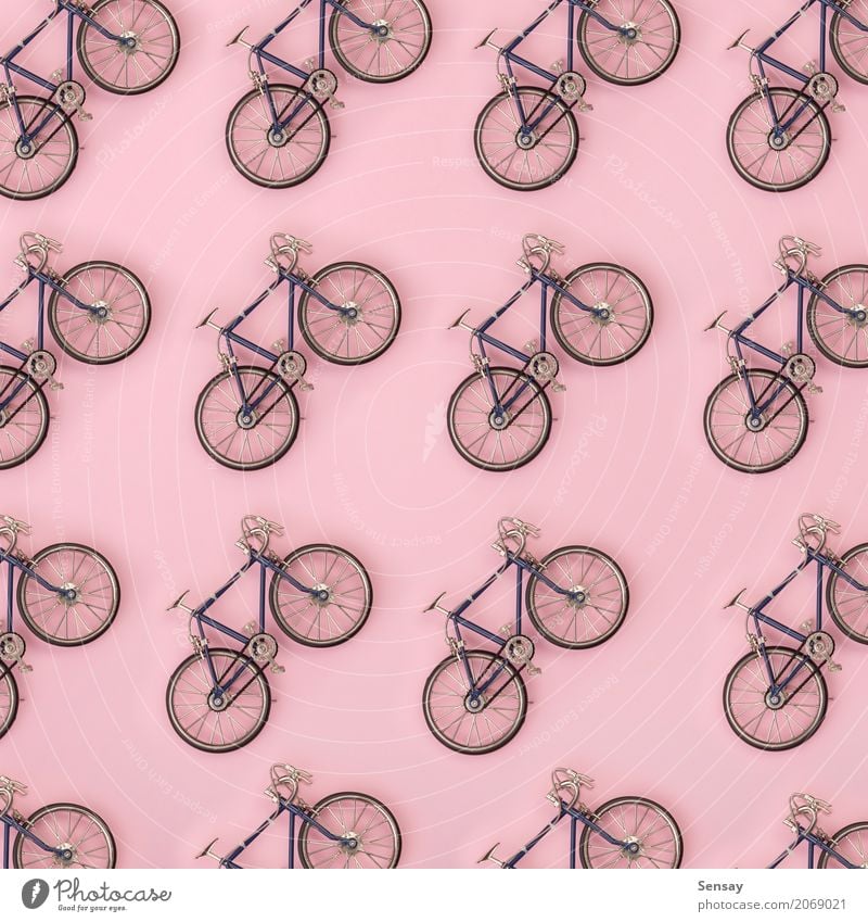 Sport pattern - toy bicycles on pink background Style Design Summer Decoration Wallpaper Sports Group Toys Fitness Bright Above Yellow Pink White Colour