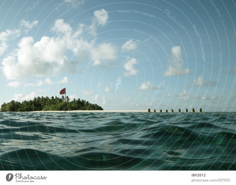 Red flag in paradise III Vacation & Travel Summer Ocean Island Waves Maldives Water Coral reef Leisure and hobbies Flag Sky Clouds Exterior shot Day Blue sky