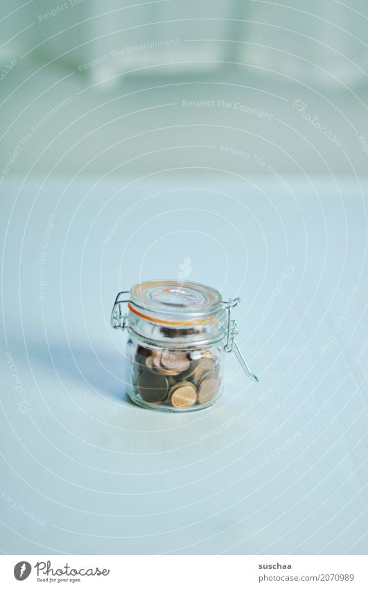 skimped Preserving jar Money Coin Cent Save saved Accumulate bad times rotten Symbols and metaphors Few Sparse annuity age Poverty Luxury Retirement