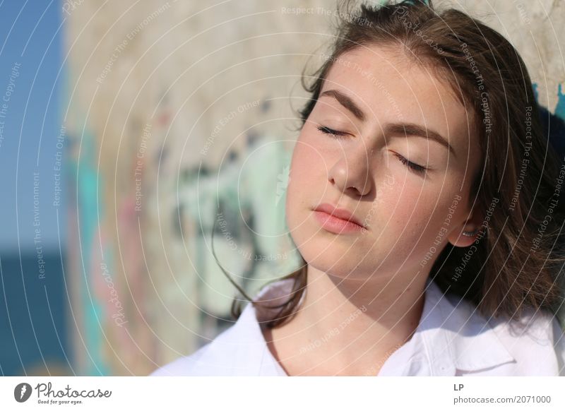 face of a beautiful girl with closed eyes, facing the sun Lifestyle Beautiful Wellness Harmonious Well-being Contentment Senses Relaxation Calm Meditation