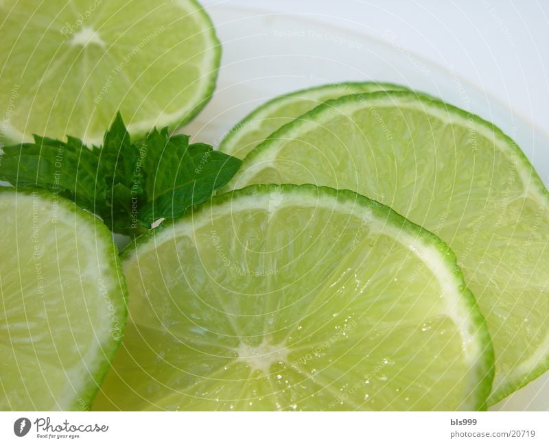 Lime slices with peppermint Drink ingredient Alcoholic drinks Close-up caipirinia ingredient Tropical fruits Slices of lime