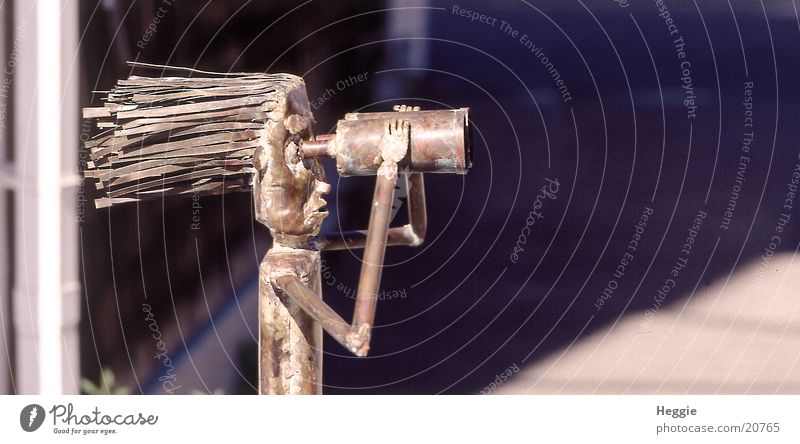 The Television Binoculars Telescope Things blowing hair tin figure